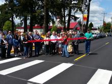 Ribbon being cut by former Mayor Debbie Rogge.