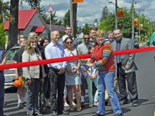 Former Mayor Debbie Rogge doing the honors of cutting the ribbon...