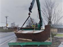 Boat being hoisted