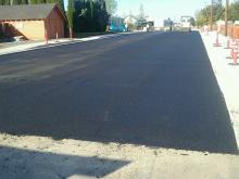 Finishing Touches - Pouring Asphalt on W. Heintz St.